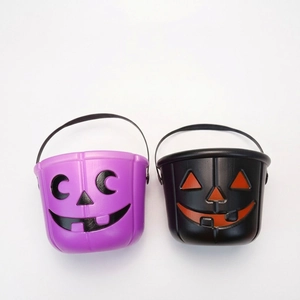 Halloween pumpkin candy buckets in purple and black with non-peeling paint finish