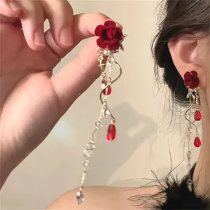 Elegant red flower tassel earrings with golden wave wire and crystal waterdrop pendants