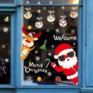 Festive Santa and reindeer window decals featuring snowflakes and Merry Christmas text