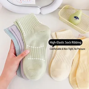 Breathable cotton crew socks in pastel macaron colors with ribbed knit high elasticity