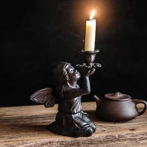 Vintage cast iron kneeling angel candle holder with wings for rustic home decor