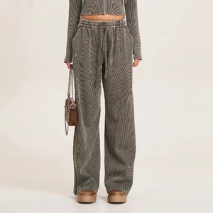 Close-up of gray washed texture fabric and drawstring on vintage straight-leg sports pants