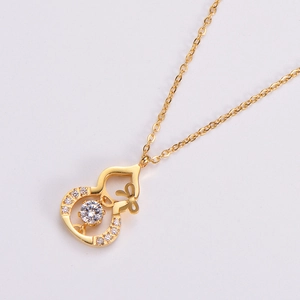 Gold plated titanium steel gourd necklace with zircon stone and bow tie detail