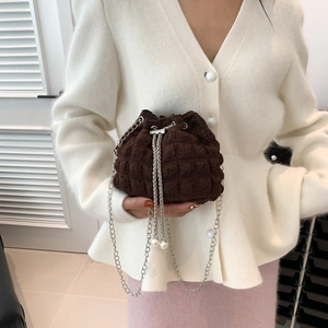 Fashionable dark brown bucket bag with pearl drawstring and silver chain strap