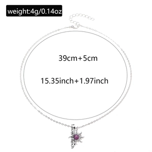 Detail view of sunflower necklace showing dimensions 1.8cm pendant and 39cm plus 5cm chain
