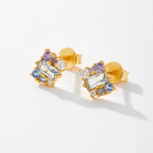 Detailed close-up of S925 silver earrings with colorful zircon and light blue main stones