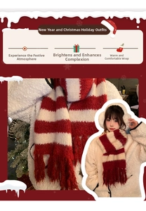 Close-up of red and white striped knit scarf featuring decorative long tassels