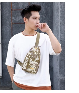 Detailed view of tactical digital camouflage sling bag with adjustable strap on model