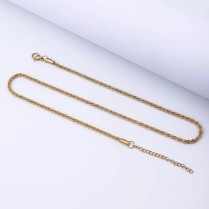 Detail of a gold stainless steel popcorn chain with lobster clasp on a white background