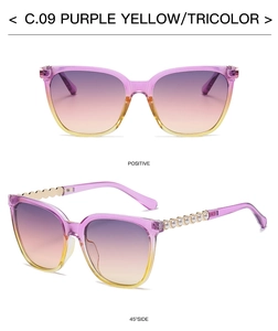 Detail of square vintage sunglasses with pearl chain temple and purple gradient lenses