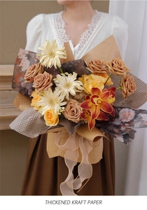 Detail of thickened kraft paper for floral wrapping held by a model for bouquet packaging