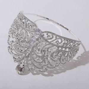 Detailed side view of silver bridal crown featuring zircon stones and large teardrop pendant