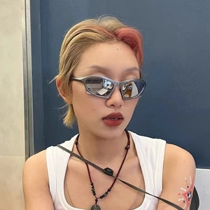 Y2K futuristic streamlined sunglasses with silver metallic frame and reflective lenses