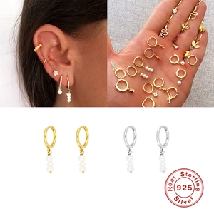 Elegant 925 sterling silver huggie earrings featuring triple white pearls in gold and silver