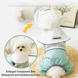 Waterproof four-legged dog raincoat with transparent hood and reflective stripe in mint green