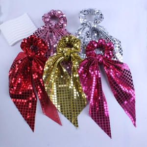 Sparkly sequin hair scrunchies with long ribbons in red, pink, gold, silver and rose colors