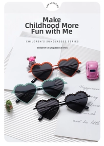 Detailed view of heart-shaped kids polarized sunglasses with floral accents in three colors