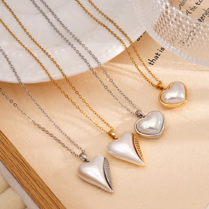 Minimalist titanium steel heart pendant necklaces in gold and silver with pearl luster
