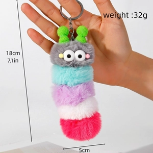 Colorful plush caterpillar keychain accessory held by hand, measures 18cm long