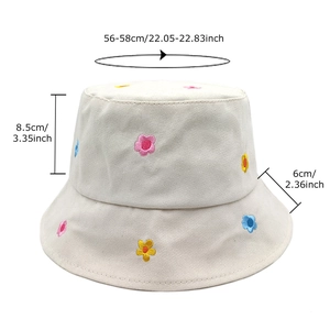 Cream bucket hat with floral embroidery and detailed size guide for women in summer