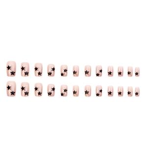 Sparkly light pink press-on nails with black stars, 24-piece set in a sweet and cool style