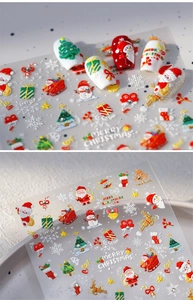 Macro detail of 5D embossed Christmas nail stickers with Santa and reindeer motifs