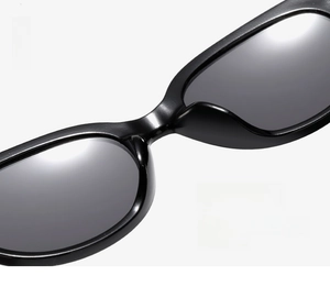 Detail of integrated nose pads on black cat-eye sunglasses for a comfortable fit
