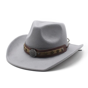 Close-up of light gray wool felt cowboy hat with brown leather band and star metal rivets