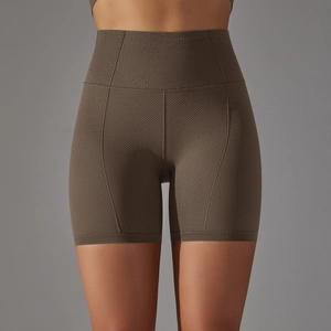 Détail macro du short de yoga taille haute avec tissu texturé en nid d'abeille