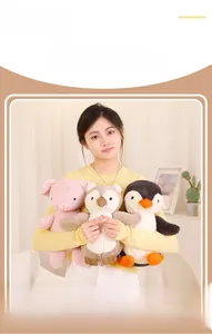Close-up of soft plush toys featuring skin-friendly smooth fabric held by a model