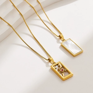Retro stainless steel necklaces with white mother-of-pearl and tarot-inspired gold pendants