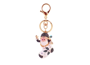 Detail of Christmas Santa Claus boot keychain with sparkling rhinestones and gold clasp