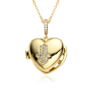 Golden heart locket necklace with Hamsa Hand pendant featuring micro-paved crystals