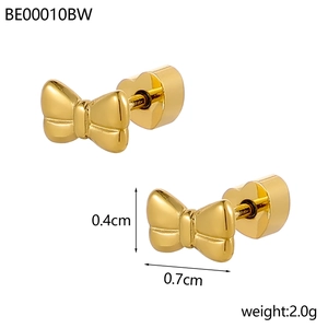 Detail view of 0.7cm gold bow earrings with heart screw back, weighing 2.0g