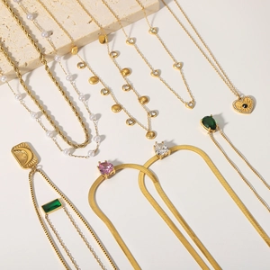 Gold stainless steel layered necklaces featuring sun moon pendants and zircon pearls