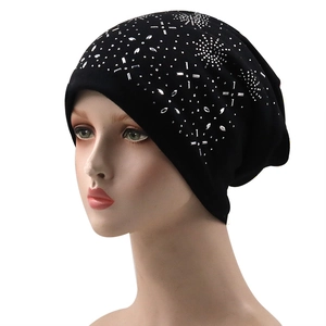 Black knitted beanie for men and women with silver rhinestones and stud floral pattern