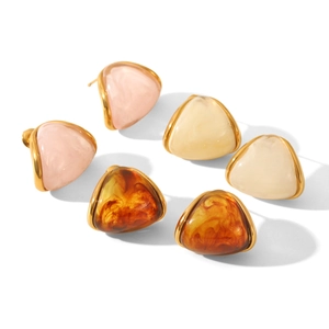 Three pairs of amber resin heart earrings in gold plated stainless steel frames
