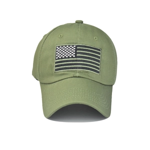 Detailed embroidery of American flag on olive green washed cotton baseball cap texture
