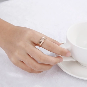 18K gold plated stainless steel striped ring featuring a minimalist textured design