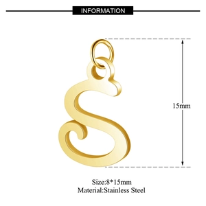 Detail of a golden cursive letter S pendant in stainless steel measuring 8x15mm