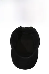 Detail showing the inner fleece lining and foldable ear flaps of a winter cap