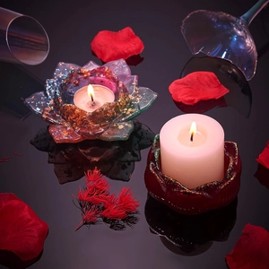 Macro view of gradient lotus candle holder with gold flakes and a red resin base
