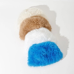 Plush faux fur bucket hats for winter in white, beige, brown and blue colors