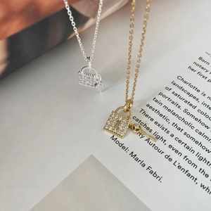 Elegant 925 sterling silver lock and key pendant necklace with sparkling pavé zircons
