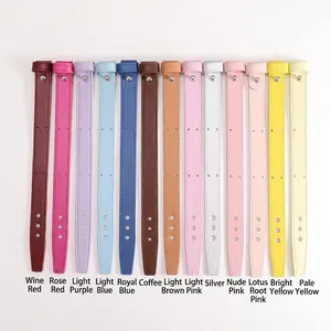 DIY leather wrist straps for phone cases in fourteen vibrant colors with metal snap buttons