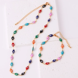 Set collana e bracciale placcati oro con ciondoli colorati Mano di Fatima e malocchio
