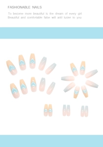 Detailed view of long ballerina fake nails with pink and blue gradient and heart designs