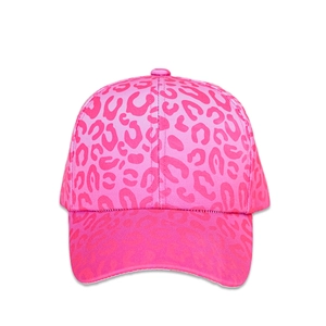 Detailed front view of kids pink leopard print baseball cap with curved brim and fabric texture