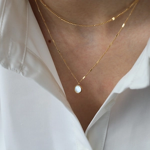French style double-layer gold necklace with circular mother of pearl pendant for women