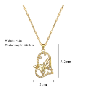 Detailed view of butterfly pendant with dimensions and weight specs for gold necklace